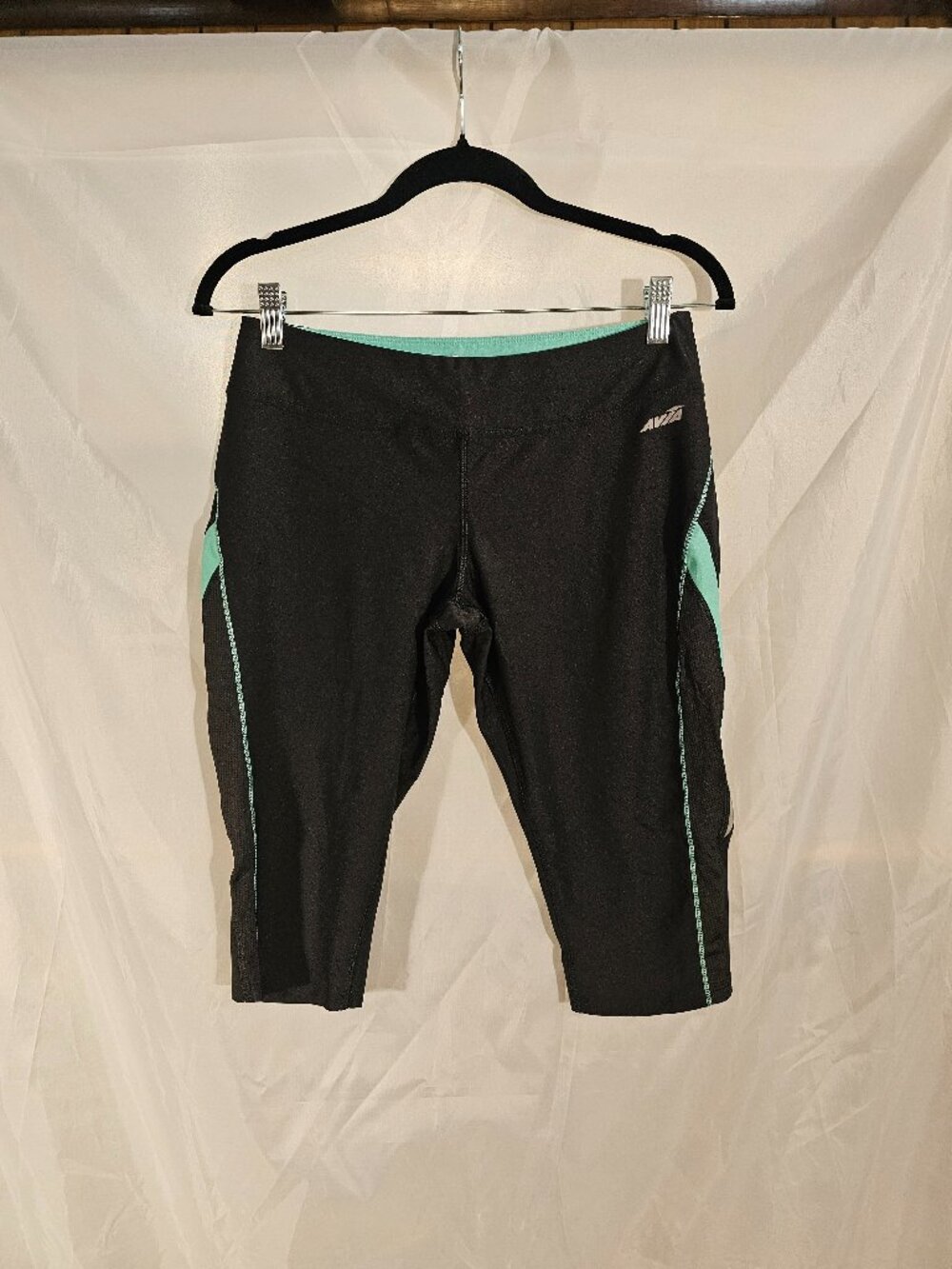 Avia black and aqua capri leggings. Size M. Like new